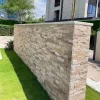 Natural Yellow Stacked Ledger Stone Landscape Feature Wall Yellow ledger stacked stone panels landscape retaining wall for private manor courtyard