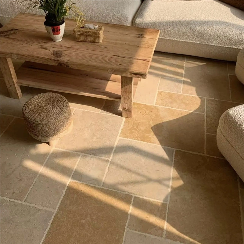 Tumbled beige limestone flooring in modern living room interior