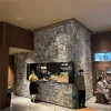 Irregular loose natural-face fieldstone mosaic veneer with grey, blue and rust mineral tones, indoor-outdoor decorative stone cladding for cafe, villa patio, garden and lobby accent walls