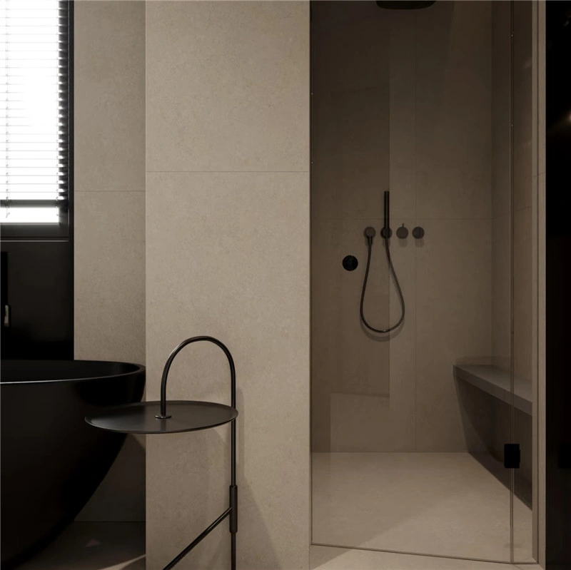 Off‑white limestone wall slabs installed inside minimalist wet room shower space