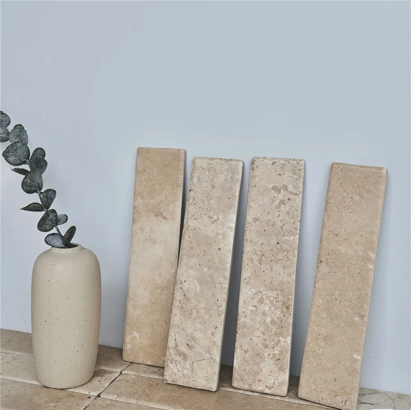 Raw loose beige travertine strip pieces for finger mosaic production