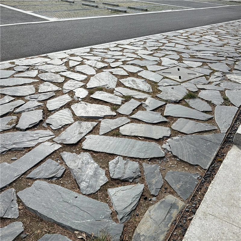 Black slate crazy paving newly laid outdoor ground paving surface