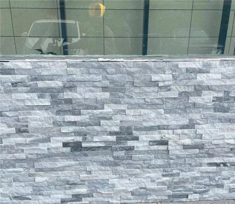 Silver stacked ledgestone wall cladding for commercial exterior facades