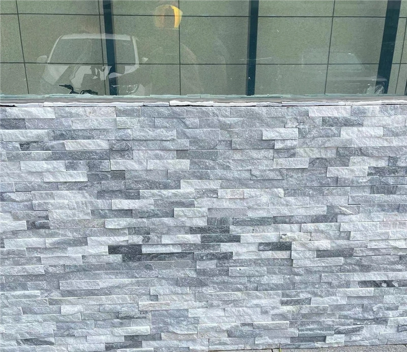Silver stacked ledgestone wall cladding for commercial exterior facades