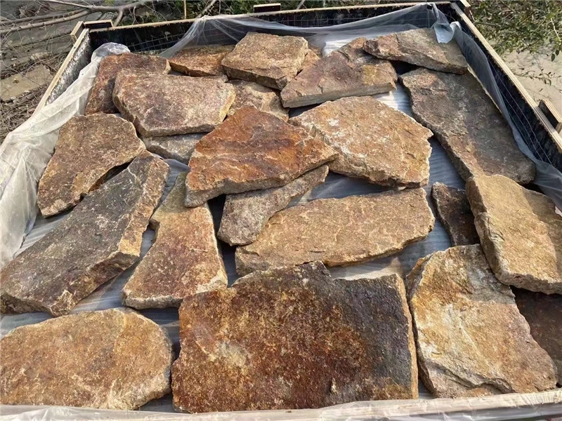 Bulk rusty yellow crazy paving stone, natural irregular loose stone pieces for exterior wall cladding
