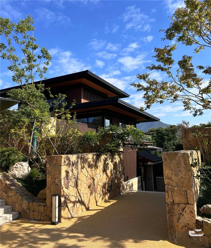 Rust Brown Crazy Paving Stone on an outdoor villa boundary wall with natural earthy tones