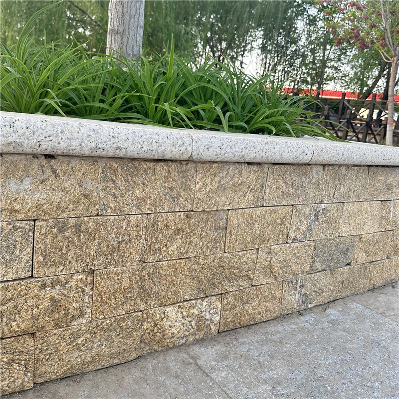 Landscape boundary wall decorated with Golden Yellow Mushroom Stone
