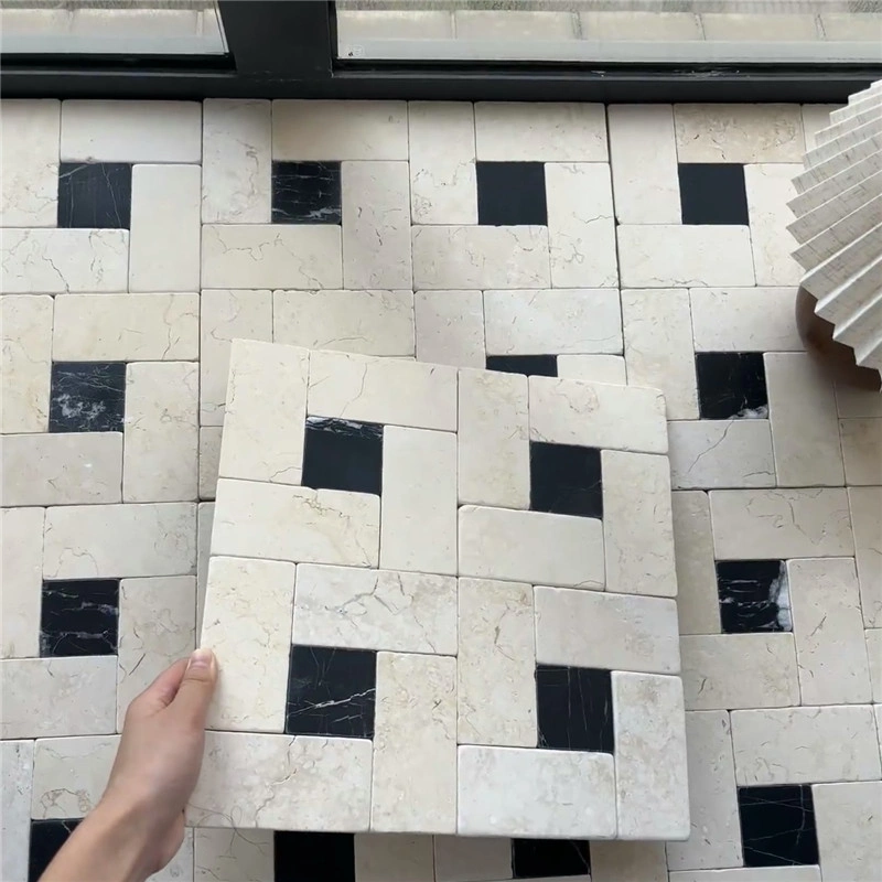 Off‑white limestone paving with black stone inlay for garden terrace flooring design