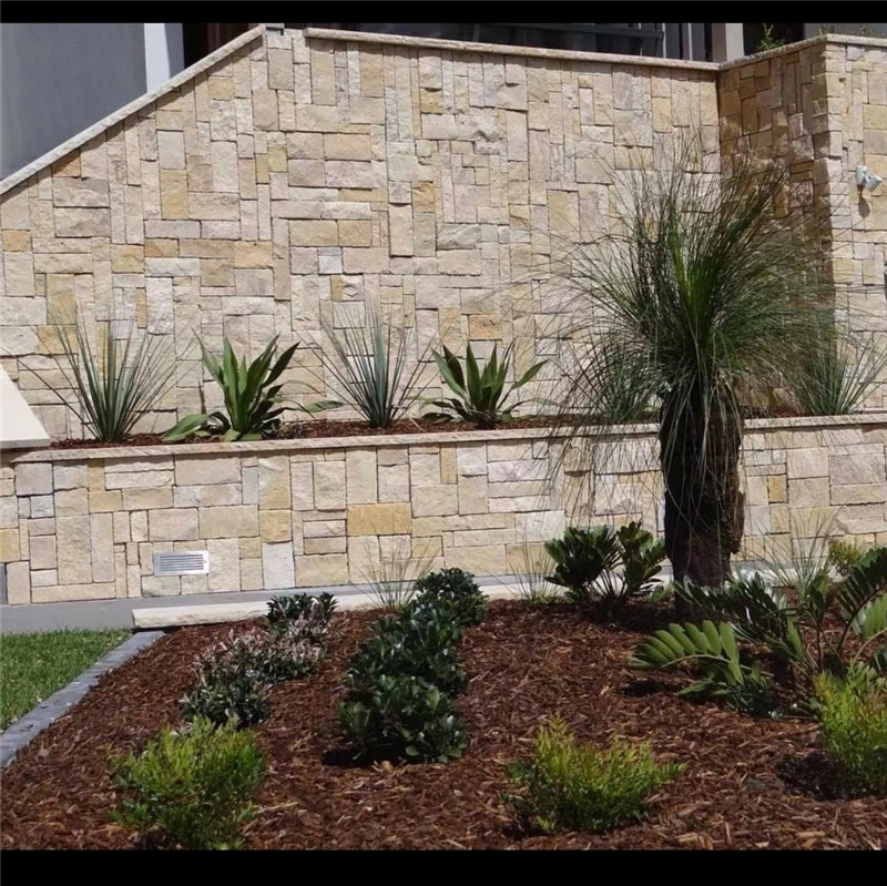 beige limestone ledger‑stone decorative garden water feature wall