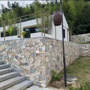 Multicolor Slate Crazy Paving on villa exterior retaining wall