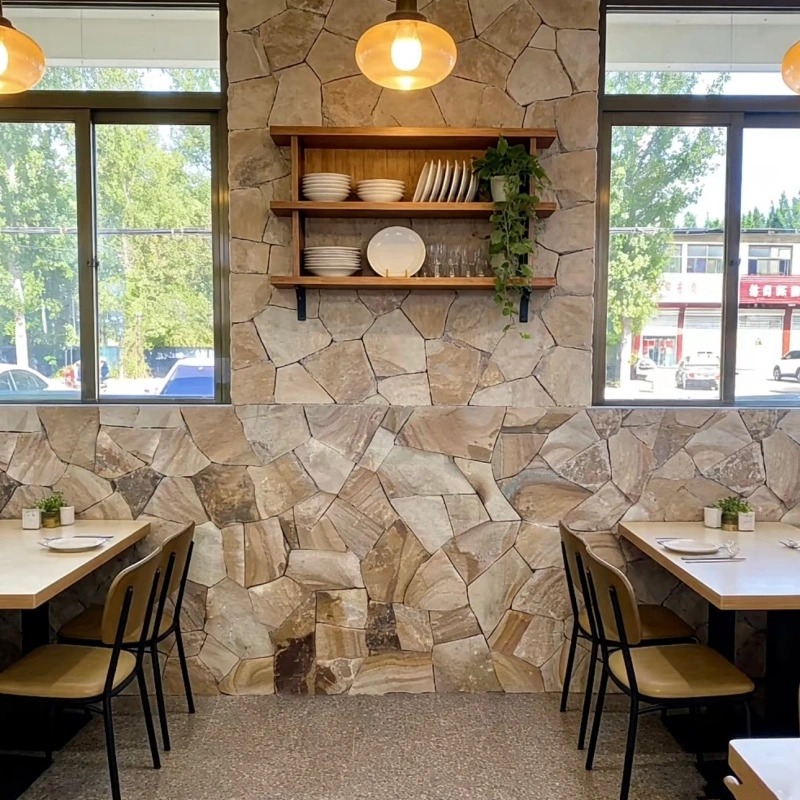 Rustic natural random stone accent wall for cafe interior design