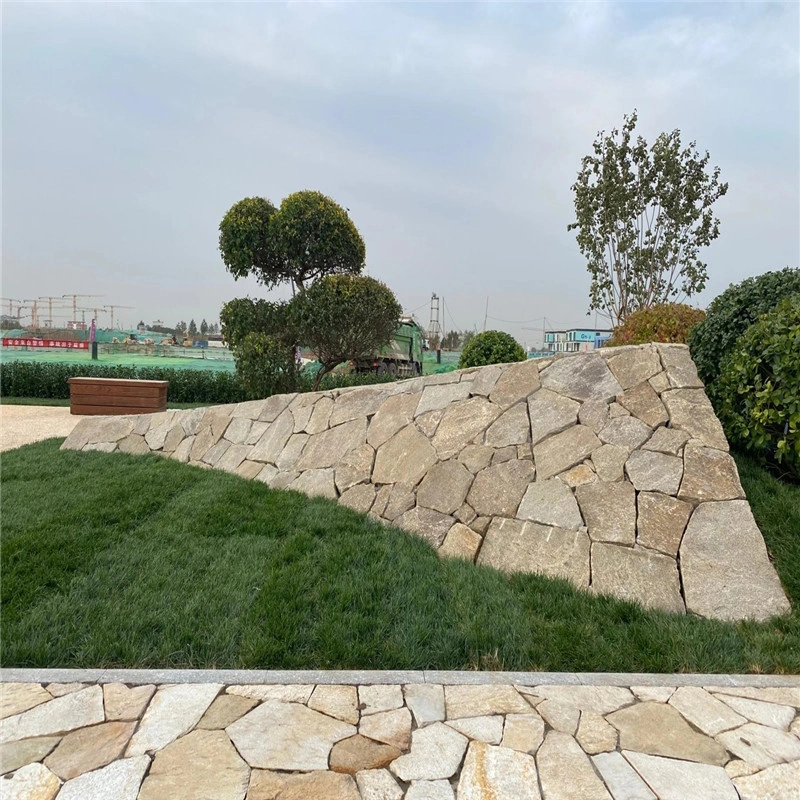 Golden rust slate crazy paving built for garden slope retaining wall

