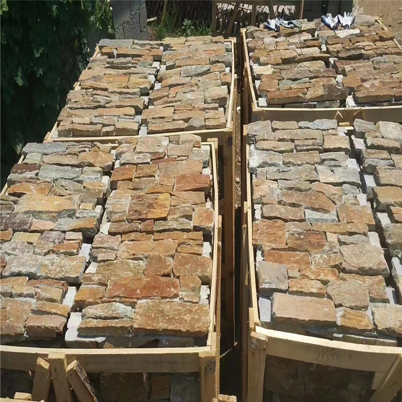 Multicolor rust slate ledger stone packed in wooden crates for export shipment