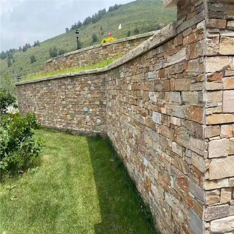 Multicolor rust slate stacked stone veneer for hillside garden retaining wall corner