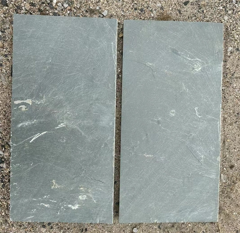 Single green slate mushroom‑faced stone slab close‑up view
