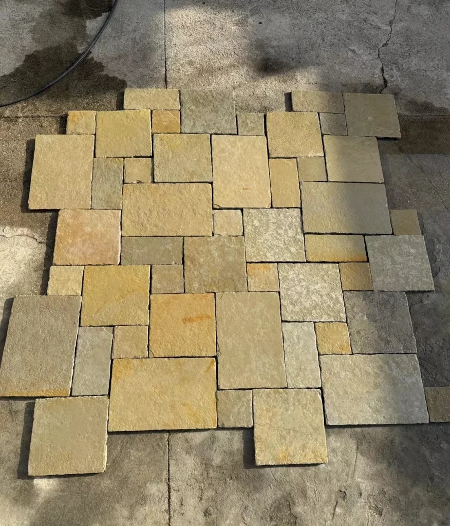 Natural yellow limestone multi-size paving slabs display