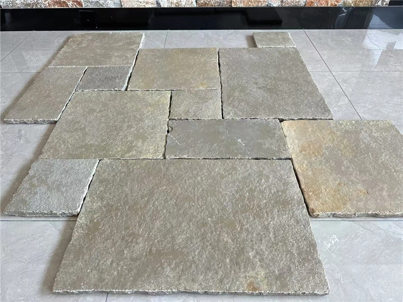 Yellow limestone multi‑size paving slabs, natural stone layout display