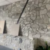 Light Grey Crazy Paving Stone Used for Interior Wall Design Light Grey Crazy Paving Stone interior wall cladding under construction