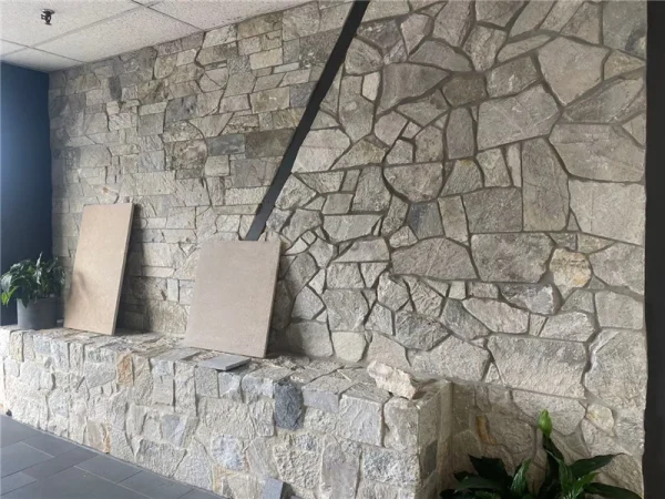 Light Grey Crazy Paving Stone Used for Interior Wall Design Light Grey Crazy Paving Stone interior wall cladding under construction