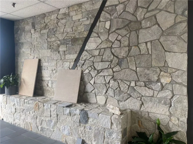 Light Grey Crazy Paving Stone interior wall cladding under construction