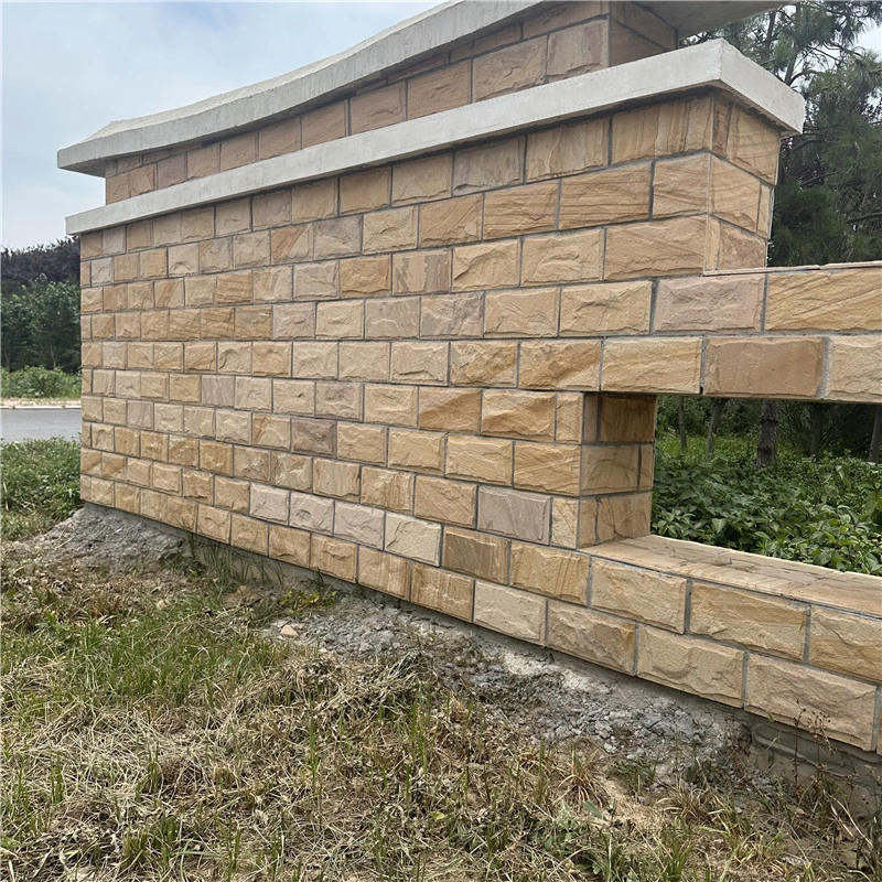 Outdoor courtyard wall cladding using yellow sandstone mushroom faced stone