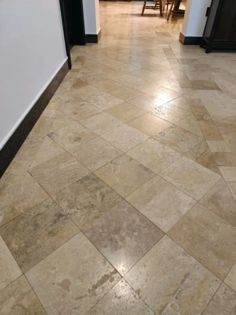Beige‑Brown Limestone flooring installed in residential interior passageway, warm natural stone finish