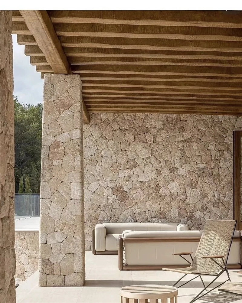 Warm Yellow Crazy Paving Stone applied on villa patio exterior wall design