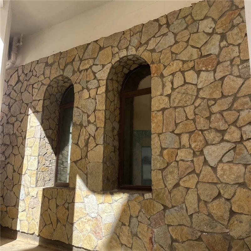 Golden Rust Random Fieldstone facade, natural stone for villa arched window wall