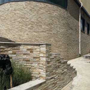 Warm Yellow Stacked Stone Panels for curved villa exterior wall cladding