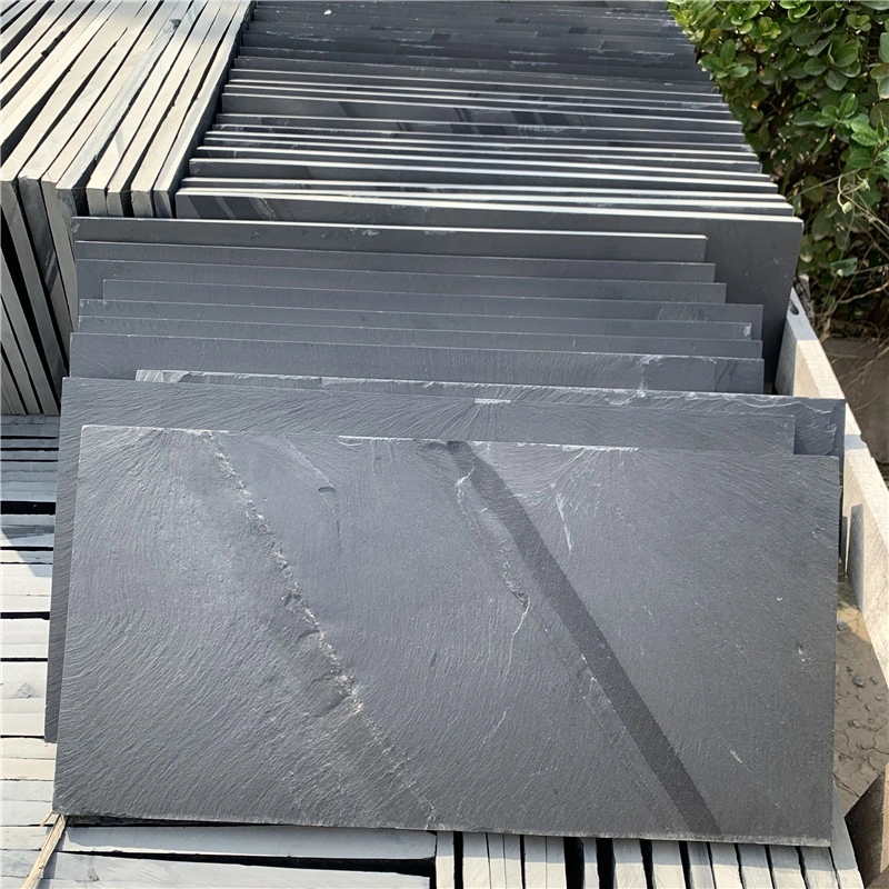 Black Natural Riven Slate, natural stone slabs stacked in factory stock