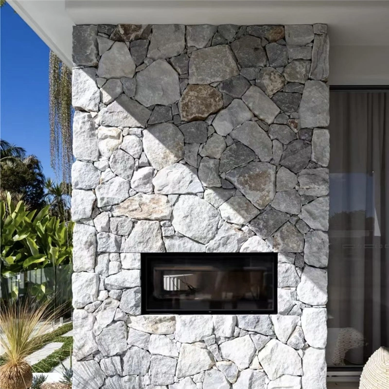 Grey irregular natural stone exterior feature wall on villa