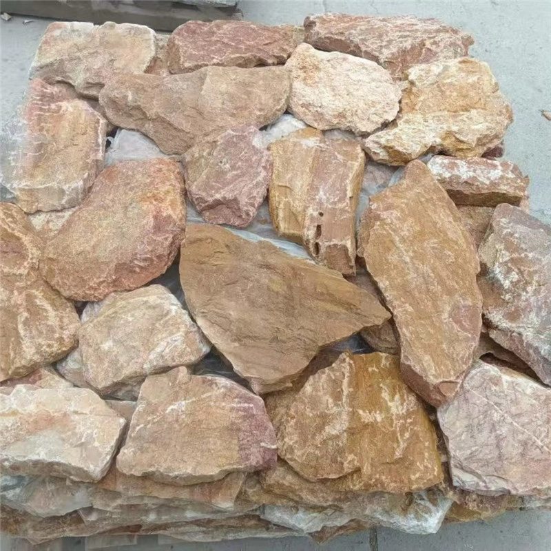 Golden Rust Random Fieldstone Wall Cladding, closeup view of natural irregular golden rust fieldstone