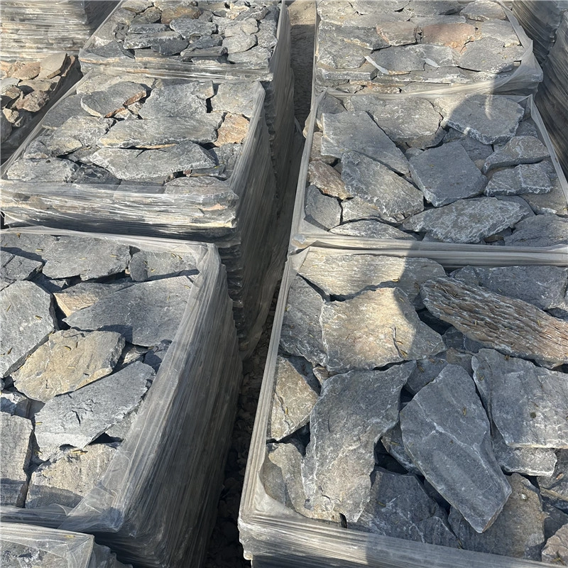 Grey irregular wall stone packed in wooden crates for export