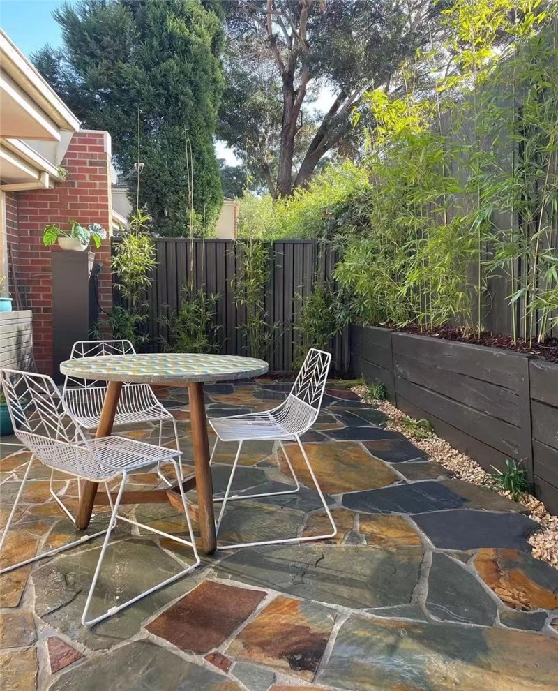 Green & Rust Random Flagstone completed patio paving for residential garden