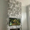 Grey white random stone wall cladding for interior fireplace feature wall