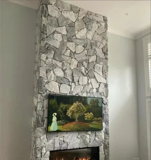 Grey white random stone wall cladding for interior fireplace feature wall