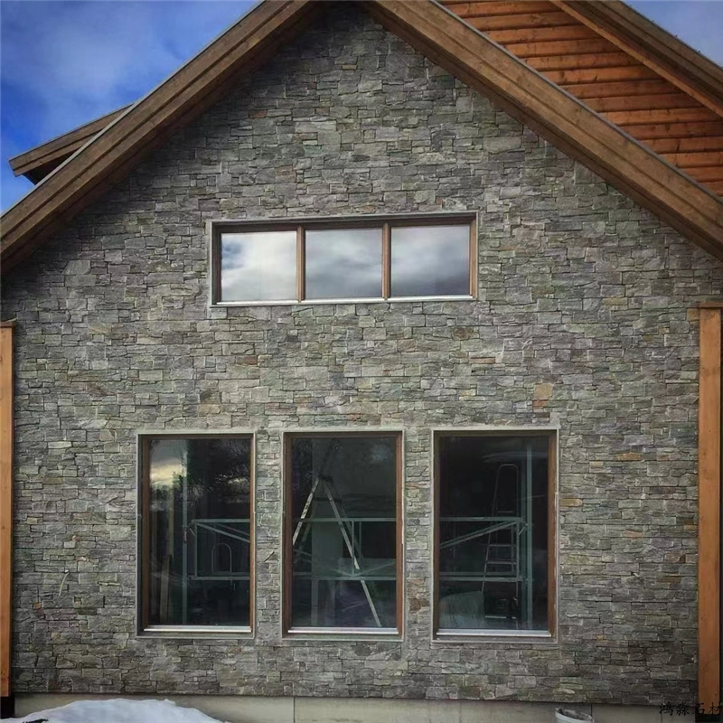 Rustic Grey Stacked Stone veneer on a residential exterior facade wall