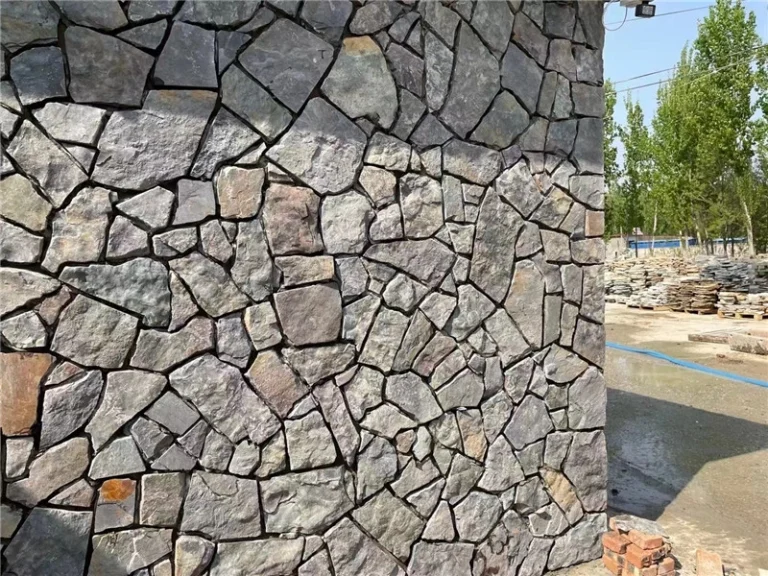 Dusky Purple Crazy Paving irregular stone wall cladding for an outdoor landscape retaining wall