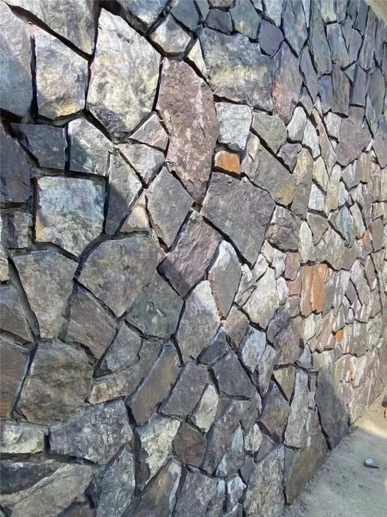 Dusky Purple Crazy Paving retaining wall with irregular stone pieces
