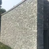 Grey Slate Ledger Stone exterior wall cladding on villa facade