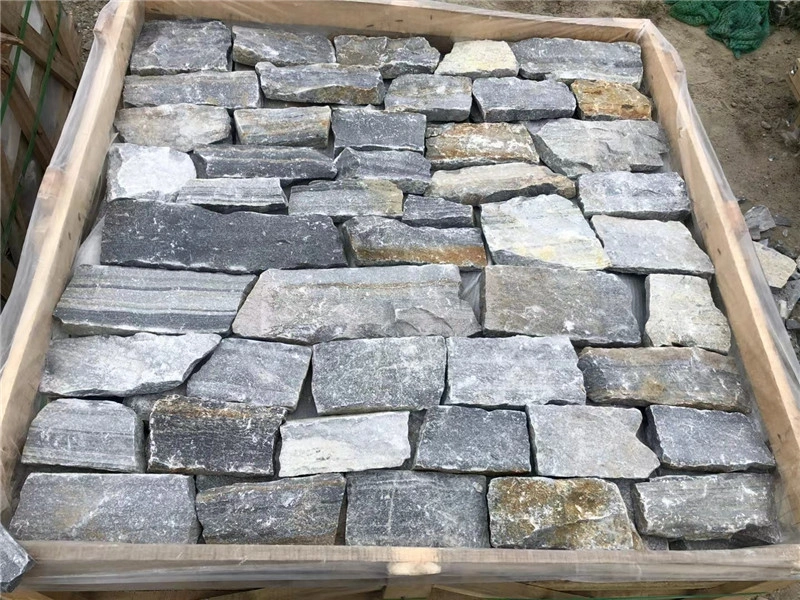 Light blue stacked stone exterior wall cladding, natural stacked stones inside export wooden crate