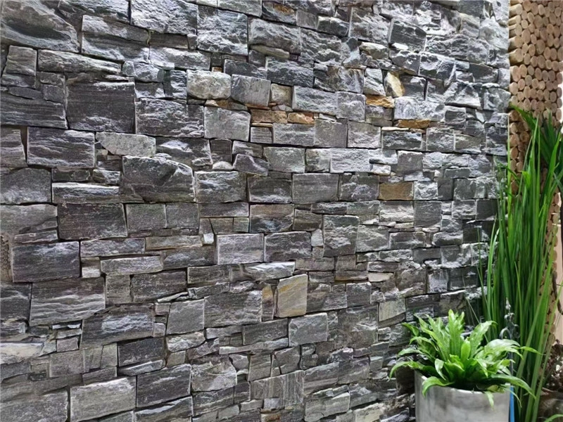 Blue Grey Slate Stacked Stone accent wall with indoor plants