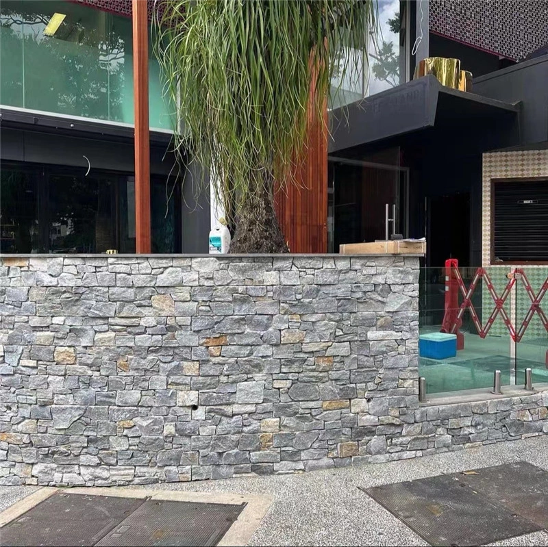 Blue Grey Slate Stacked Stone cladding on a curved landscape retaining wall