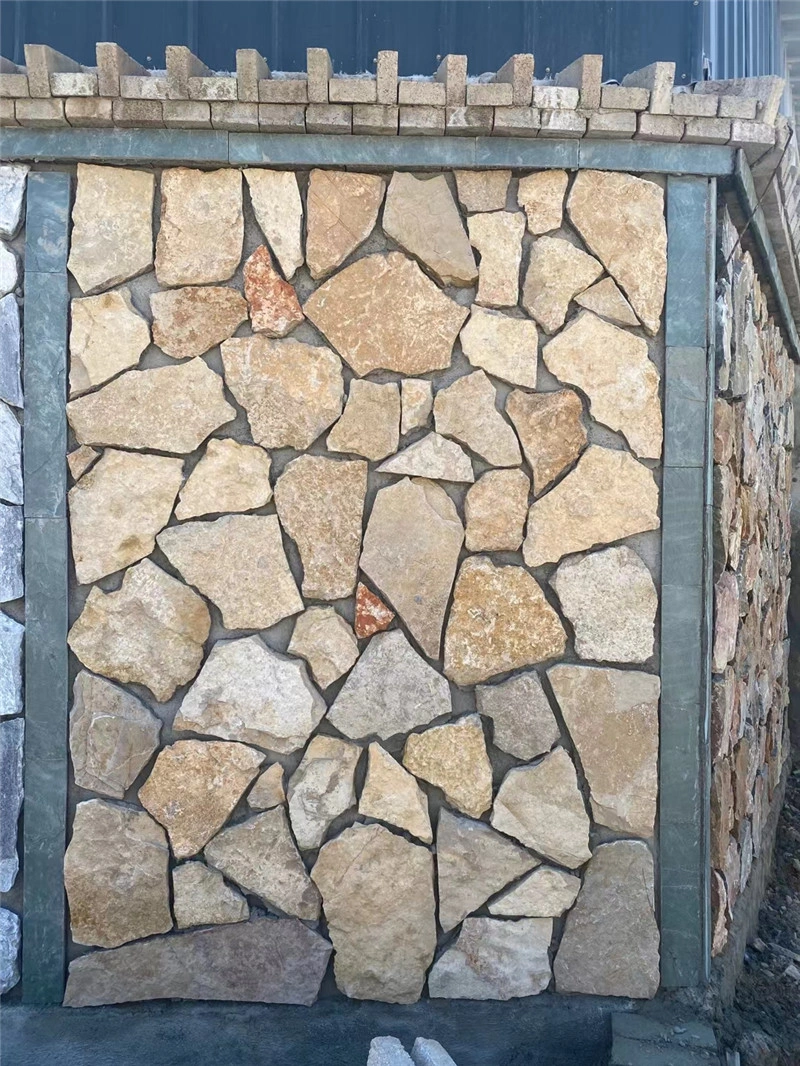 Golden Rust Random Fieldstone villa exterior corner wall, natural rustic stone facade