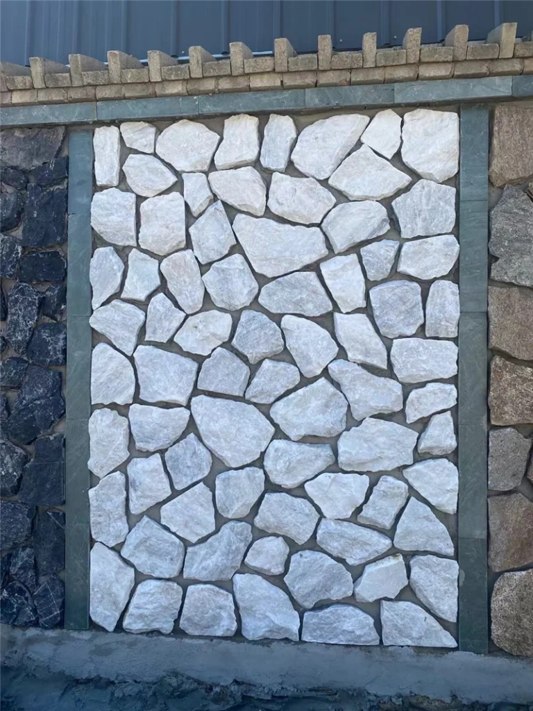 Finished outdoor boundary wall with white natural crazy paving wall stone cladding