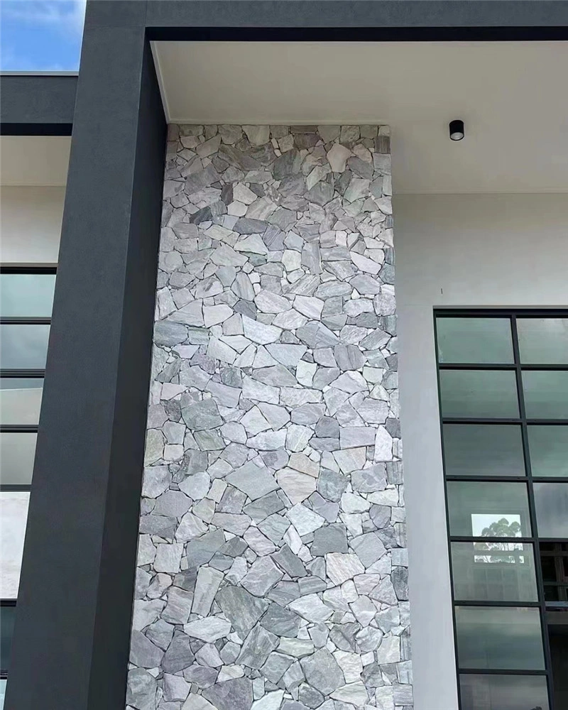 Grey White Random Stone Wall Cladding on modern residential exterior facade