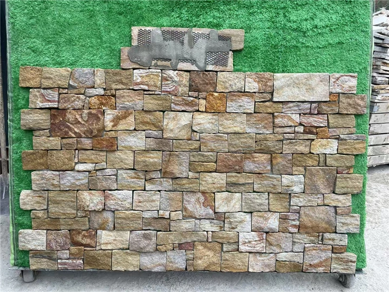 Rust colored natural stone ledger panels pre‑mounted stone panel display