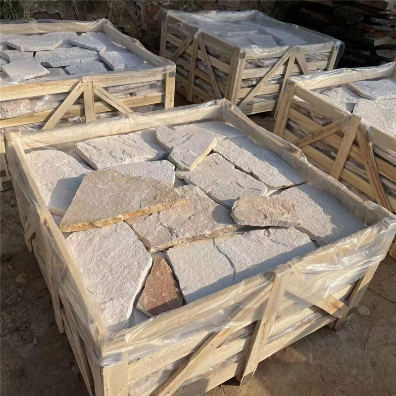 White quartzite wall cladding stone pieces prepared in wooden crates for export projects