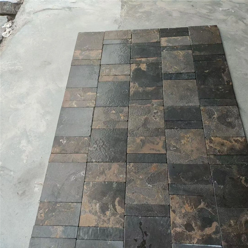 Black limestone with gold veins random-size paving, natural stone layout