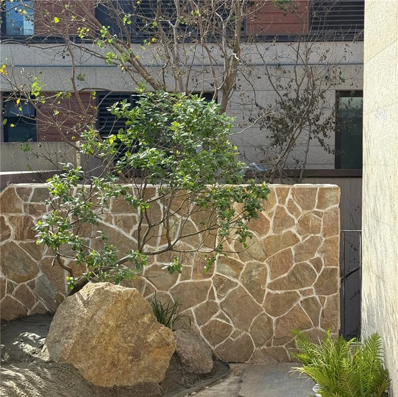 Rustic Yellow Crazy Paving Stone garden boundary wall residential backyard landscaping
